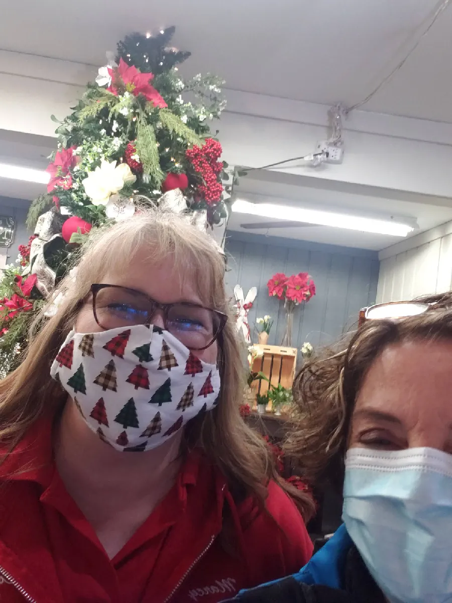jean marie and marcy wear masks at countrysides christmas open house